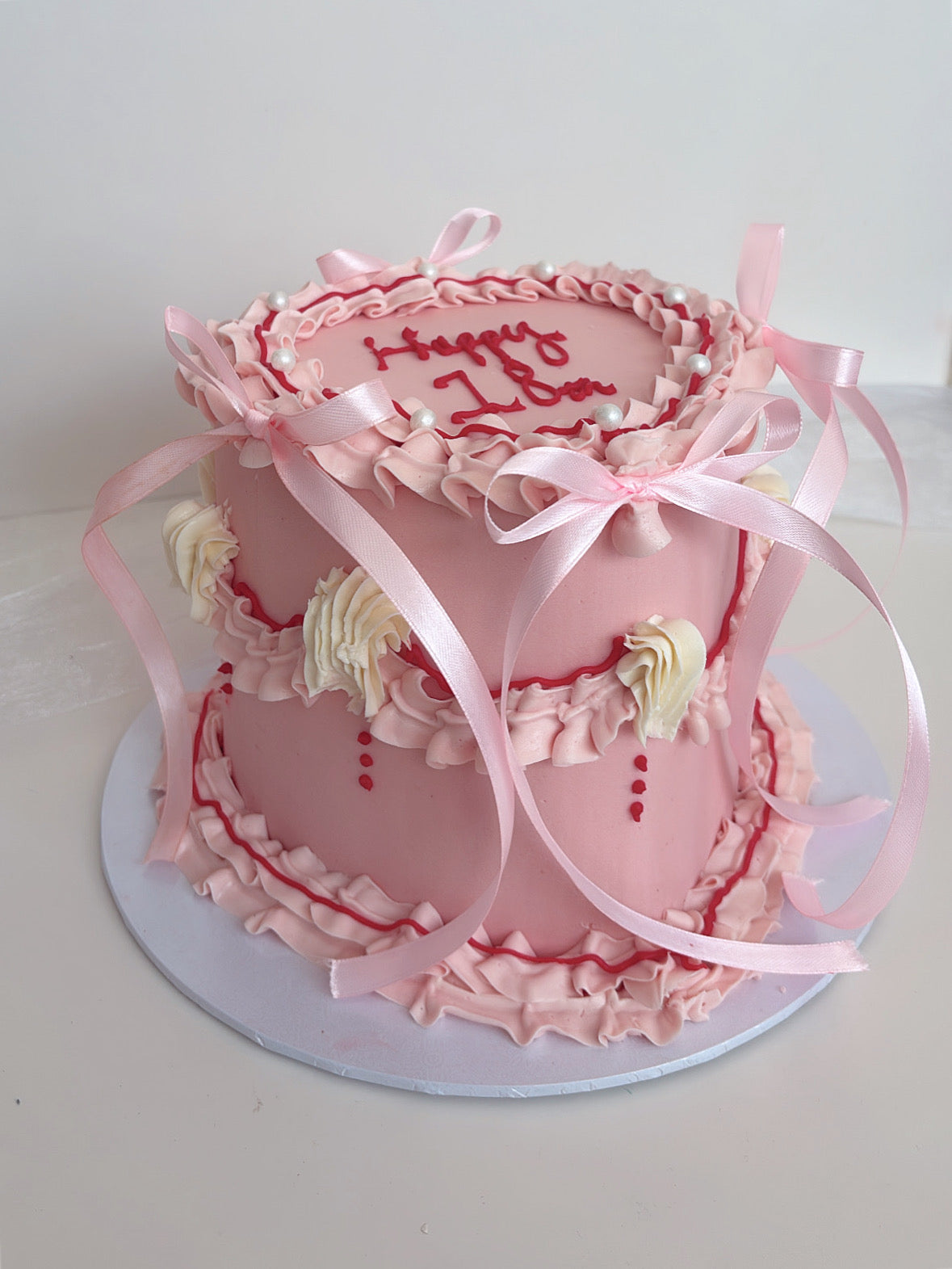 Pink & white Lambeth bow cake